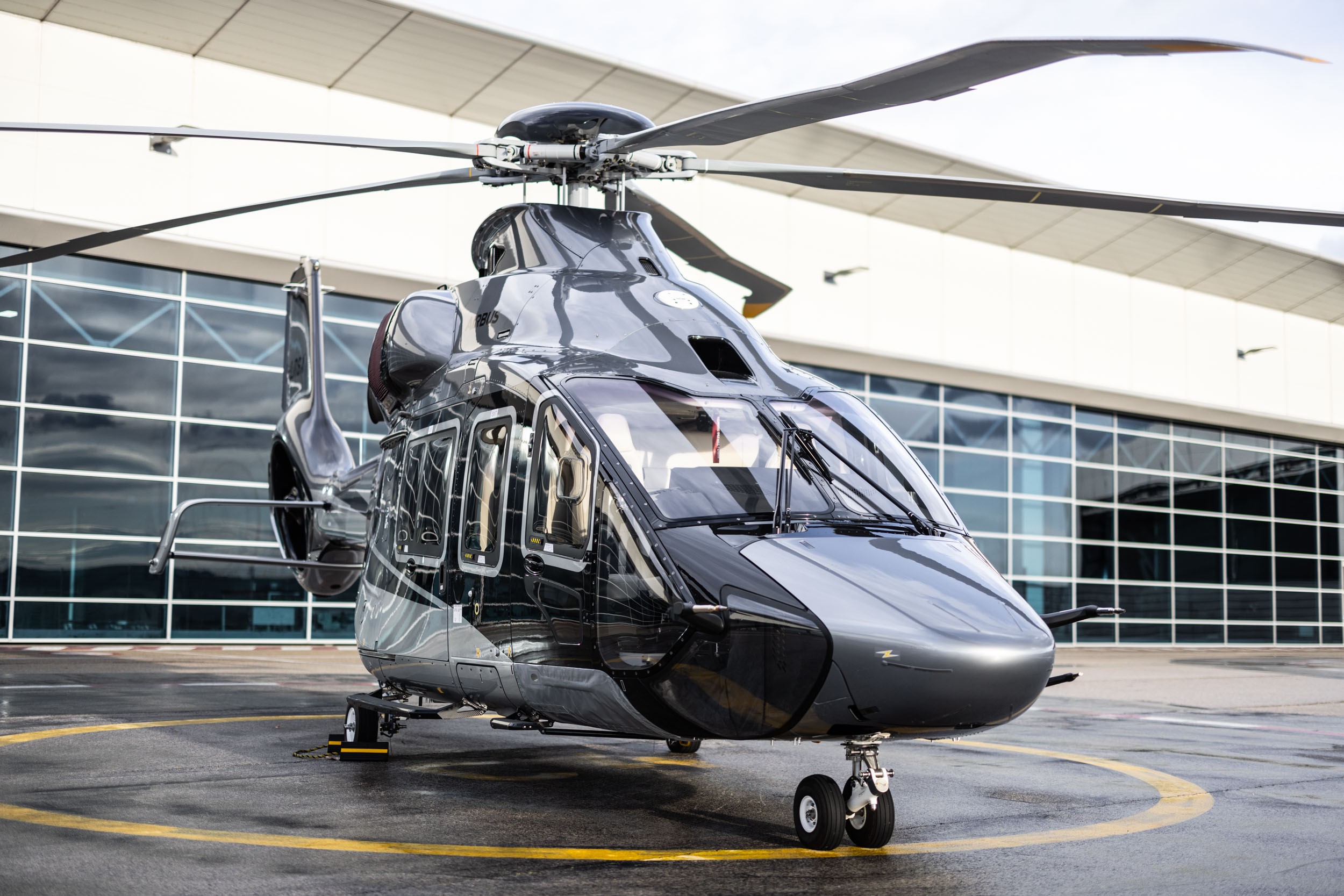 Passenger helicopter parked on the ground